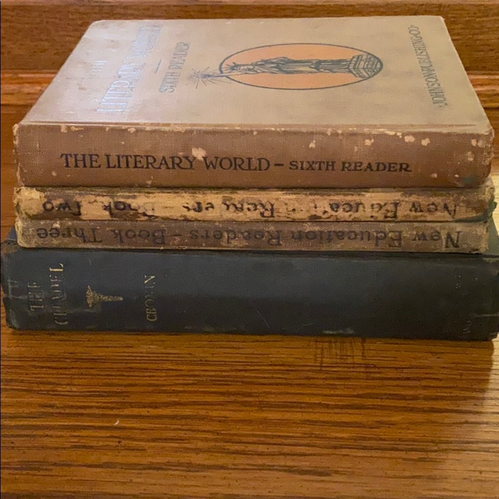 Set of 4 books from early 1900s.